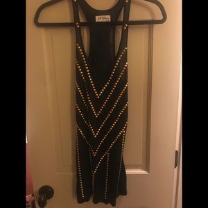 Black tank with matte gold nailheads